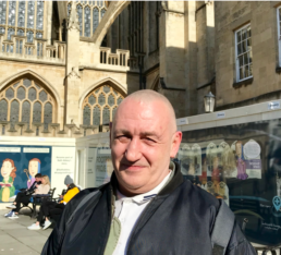 Mark standing next to Bath Abbey.