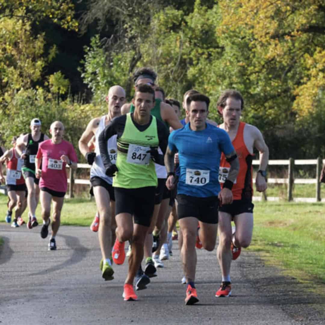 People running in a 10k race.