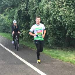 A man running the London Marathon but in his own location